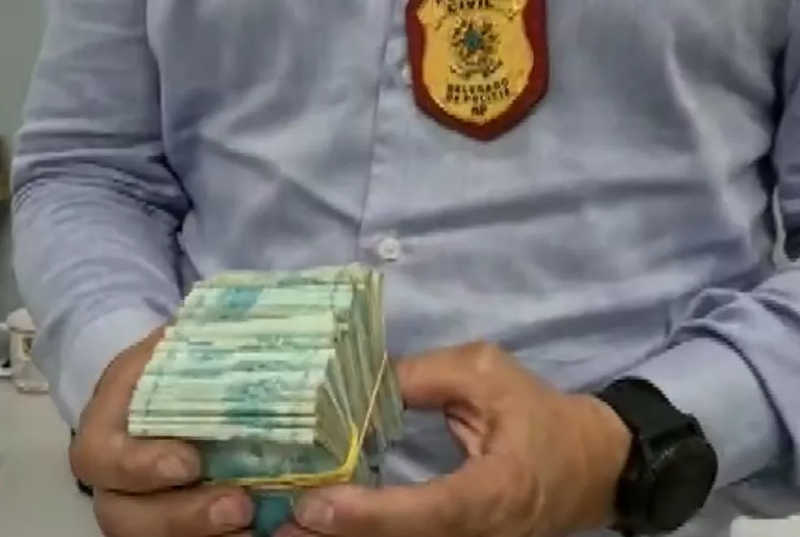Dinheiro apreendido em canil clandestino em Limeira — Foto: Reprodução/ EPTV
